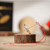 Needle Thru Coin | Nathan Kranzo
