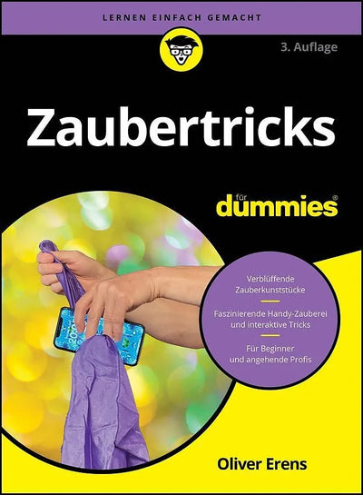 Buchcover Zaubertricks für Dummies mit Händen, die ein Smartphone unter einem violetten Tuch hervorzaubern.