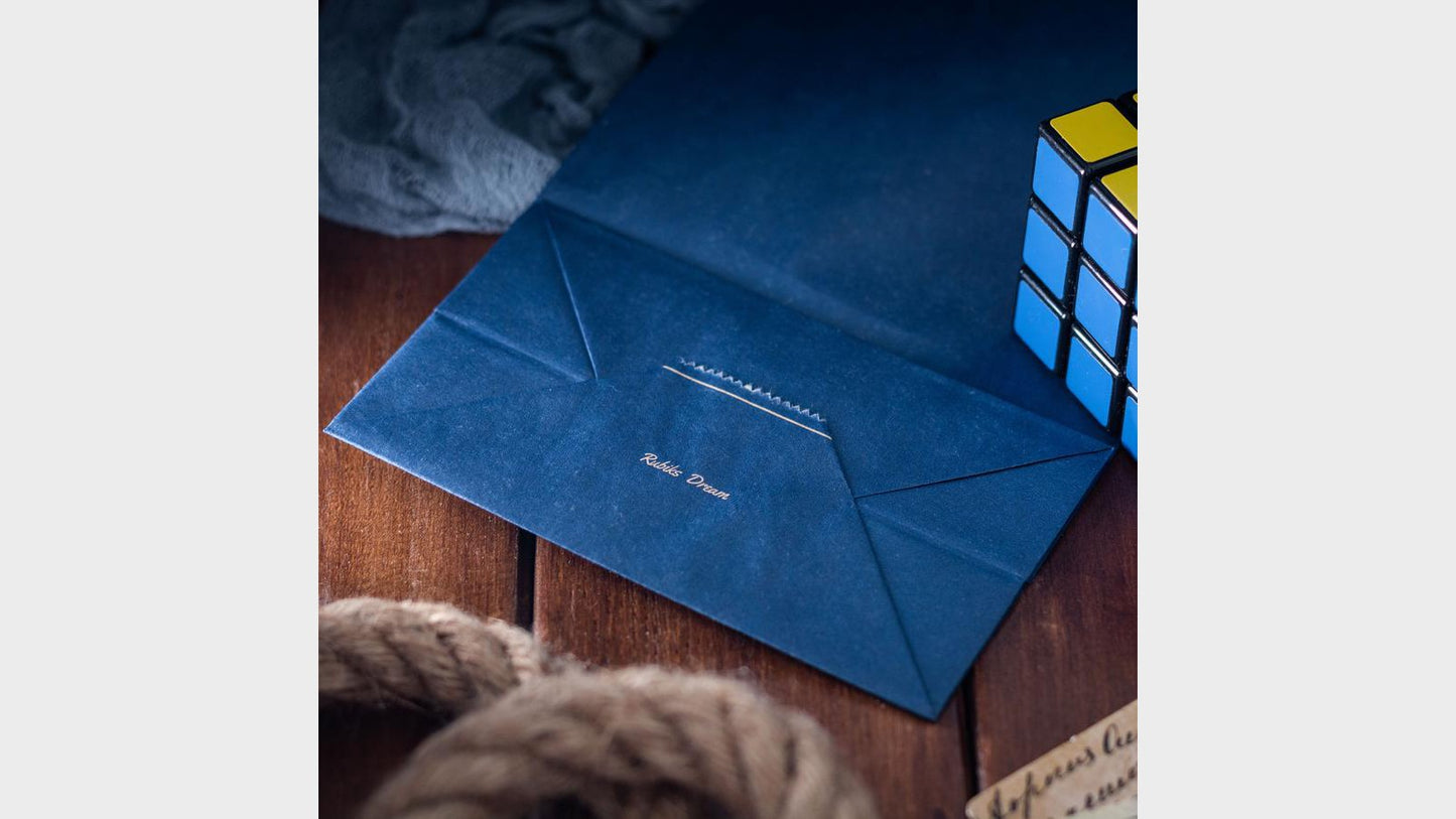 Sac en papier pour Cube Tricks bleu Henry Harris chez Deinparadies.ch